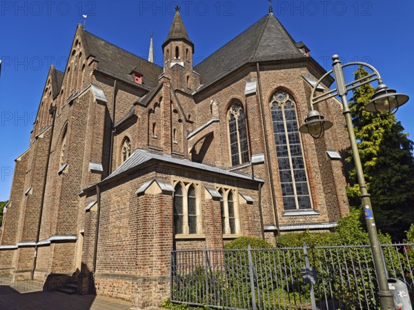 Old town with catholic church St. Margareta, brick building, architecture, religion, lantern, tree,