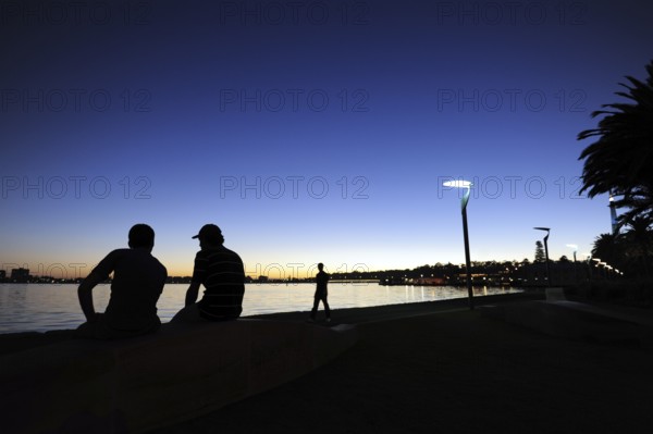 People at the riverside, evening mood at the Swan River, Central City Area, Perth, Western