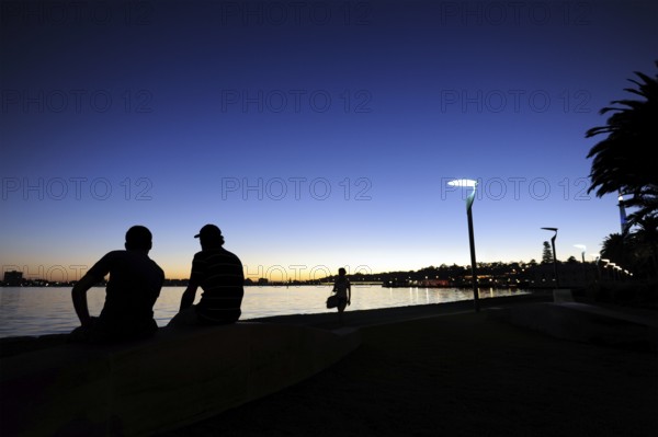 People at the riverside, evening mood at the Swan River, Central City Area, Perth, Western