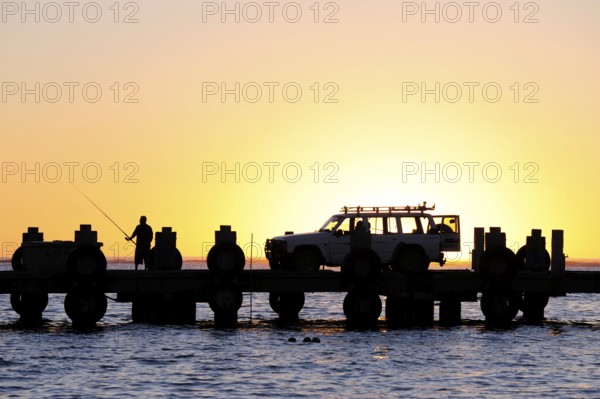 Sunset on the beach, car on a jetty near Lancelin, Perth, Western Australia, WA, Indian Ocean,