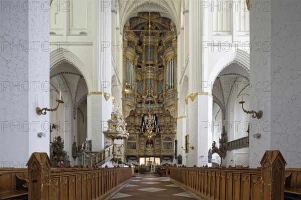 Front right and left pews in the nave, choir, half-left Renaissance pulpit from 1574 with baroque