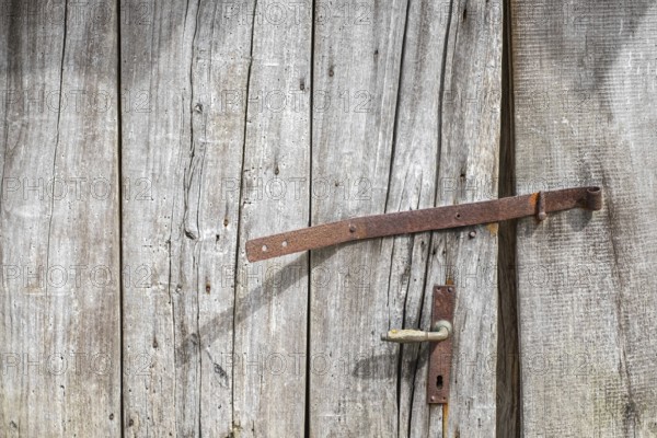 Old wooden door with iron fittings, North Rhine-Westphalia, Germany