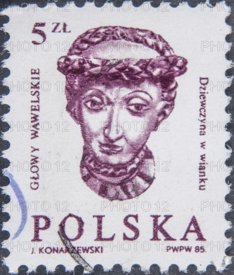 Wawel Head – Renaissance sculptures of wooden heads adorning the ceiling of the Ambassadors' Hall