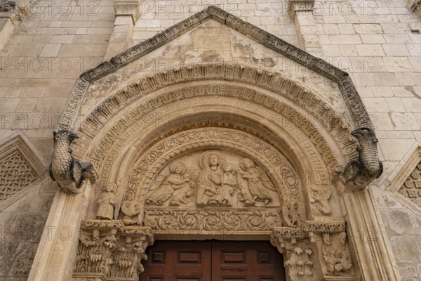 Relief above the portal of the church of Santa Maria Maggiore in Monte Sant'Angelo, Gargano,