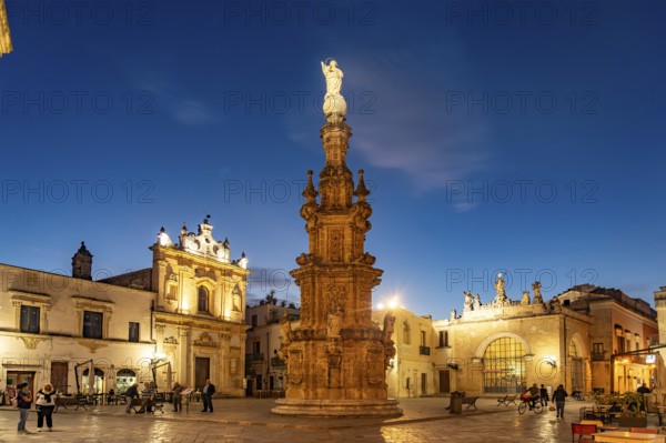 The Piazza Salandra square with the Guglia dell'Immacolata column and the Chiesa di San Trifone