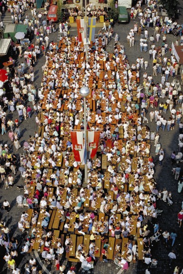 View from the tower of St John's Church of the annual well-attended town festival, crowded visitors