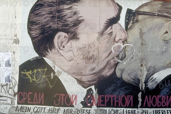 Artwork shows Leonid Brezhnev and Erich Honecker kissing, painting was created in 1990 at the