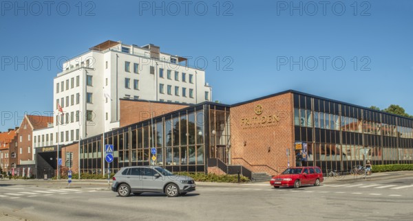Hotel Fritiden in Ystad. The white part newly built in 2020 and the other is a converted public