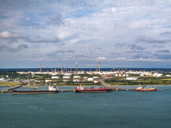 Gas tankers over refinery Esso Oil Terminal from drone, Southampton, Hampshire, England, United