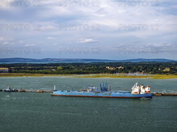 Gas tankers over refinery Esso Oil Terminal from drone, Southampton, Hampshire, England, United