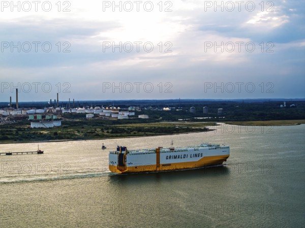 Grimaldi Lines Vehicles Carrier Grande Texas over refinery Esso Oil Terminal from drone,