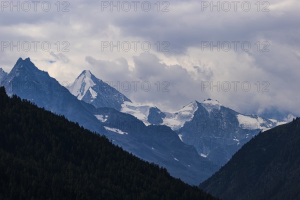 The Besso mountains with twin peaks and the Obergabelhorn, view from Ayer, Val d'Anniviers, Valais