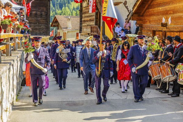 Drummers' and pipers' meeting in Mission, here the Echo des Alpes brass band marching in, led by a