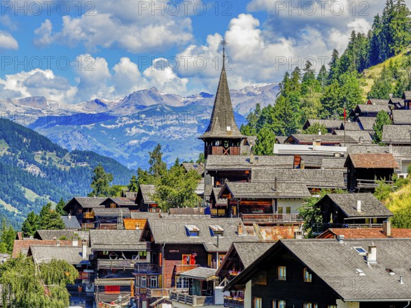 The mountain village of Ayer with the church of Saint Anna, drone image, Val d'Anniviers, Valais