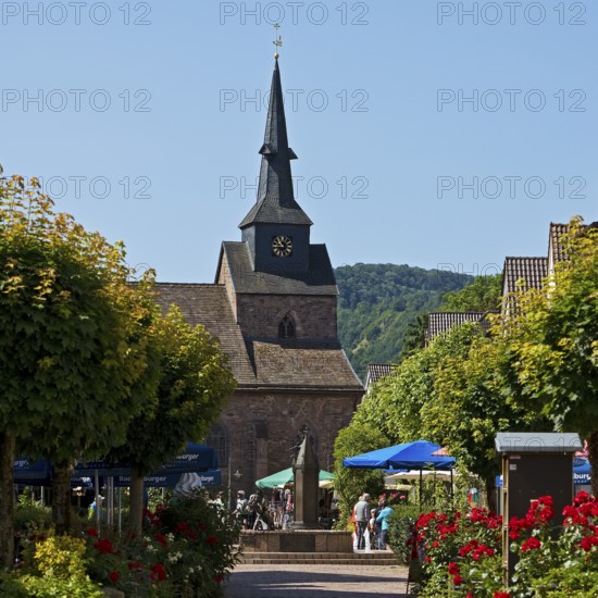 Pedestrian zone to the Protestant town church of St Nicolai in the Münchhausen town of Bodenwerder,