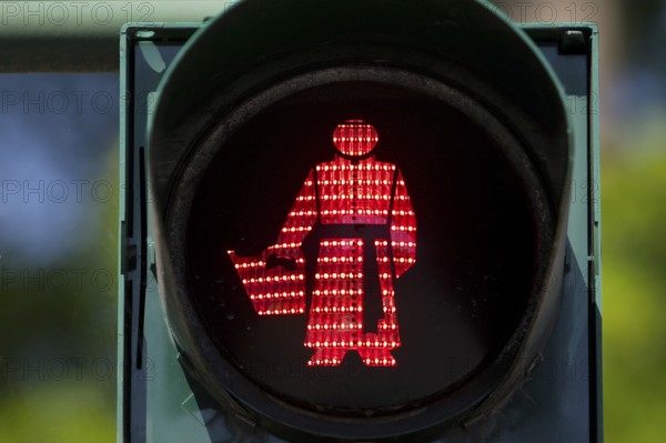 Traffic light man with Sebastian Kneipp, pedestrian traffic light with water doctor in the red