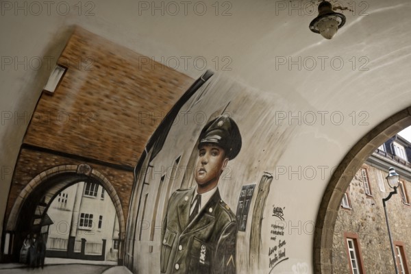 Graffiti by Gnasher in the archway, the castle gate was the backdrop for the cover of the Elvis