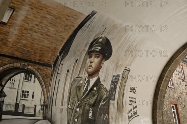Graffiti by Gnasher in the archway, the castle gate was the backdrop for the cover of the Elvis