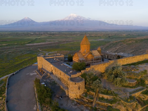 Historical monastery at sunrise with a view of Mount Ararat, aerial view, Chor Wirap monastery,