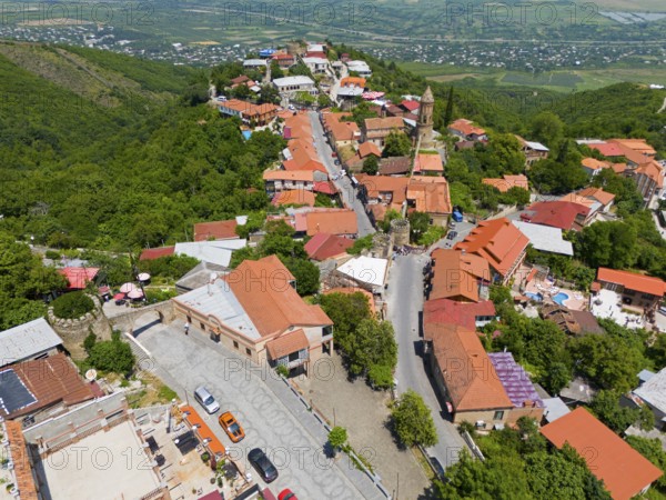 Hilly street view with traditional buildings and panoramic distant view, aerial view, Sighnaghi,