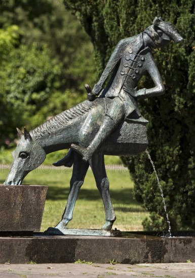 Münchhausen fountain by Bruno Schmitz with Münchhausen on the halved horse, Bodenwerder,