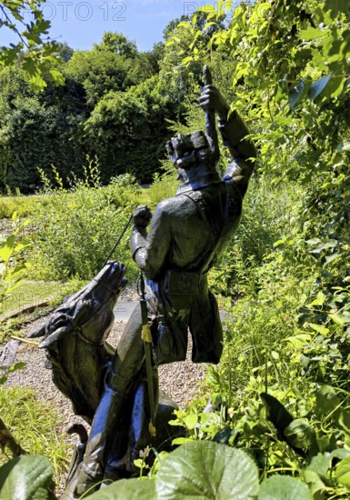Statue of the swamp scene Pulling yourself out of the swamp by your own bootstraps in the