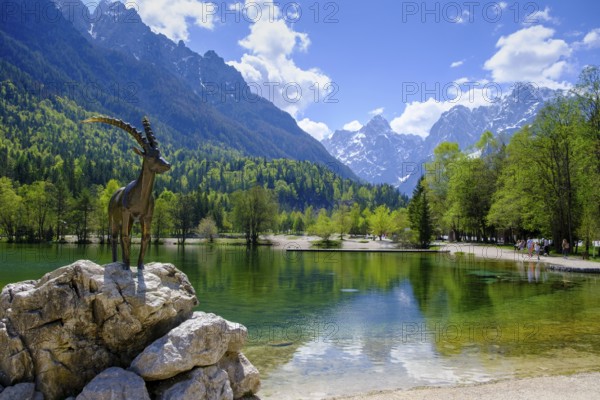 Ibex sculpture at Jasna Lake in Triglav National Park, Kranjska Gora, Upper Carniola, Julian Alps,