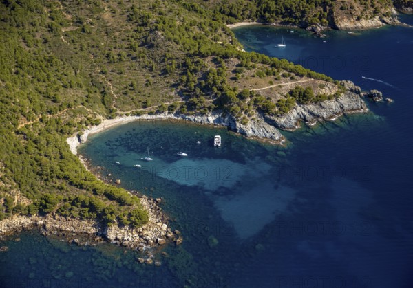 Bays for sailboats and divers, Mediterranean Bay of Roses, blue water, Roses, Costa Brava,