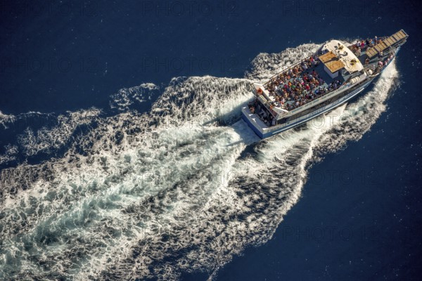 Excursion boat to Cap Norfeu, Cap de Creuers Cadaques, Mediterranean Bay of Roses, blue water,