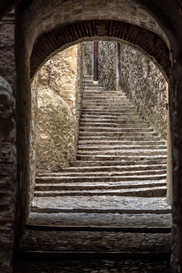 Call, Jewish quarter in the old town of Girona, stone gate with stone steps, alleys in the old town