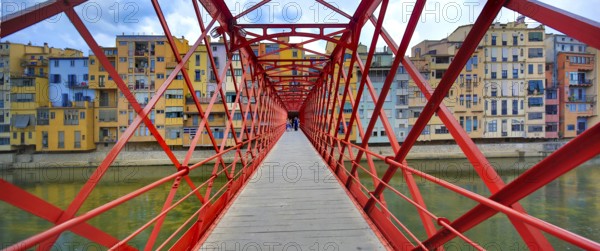 Red bridge over the river Onyar built by the Eiffel company, Cataluña, Gerona, Cataluña, Europe,