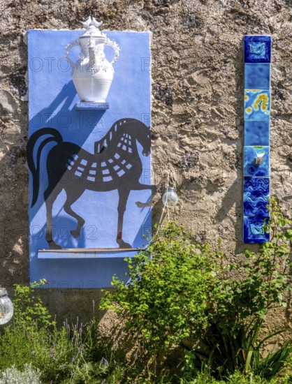 Sardinia, artwork wall fresco with horse symbol, white jug and mosaic stones, Tinnura, Europe,