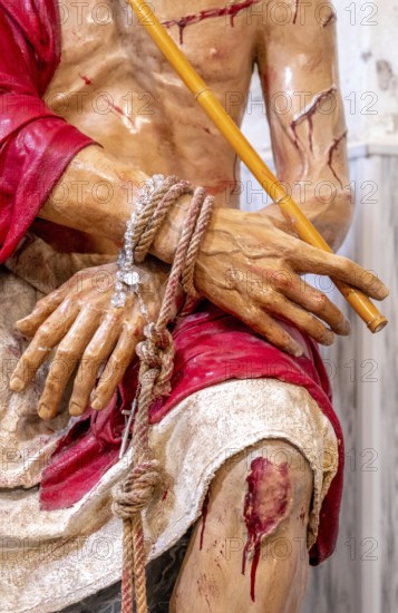 Sardinia, maltreated and bleeding Jesus figure, bound, Bosa, Europe, Province of Oristano, Italy,