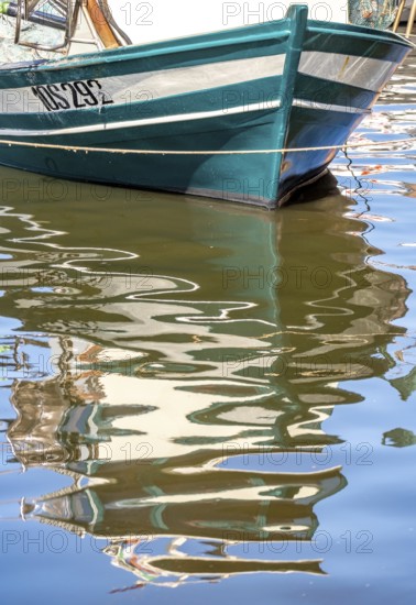Sardinia, front of a fishing boat with reflection in the river Temo, Bosa, Europe, Province of
