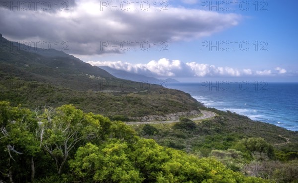 Sardinia, coastal road, mountains, sea, blue sky with clouds, Villanova Monteleone, Europe,