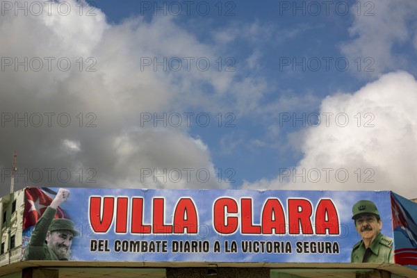 Comandante Fidel Castro on a poster in the city centre, Streetlife in the city centre of Santa