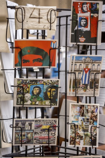 Kiosk saleswoman, Cuban, postcard stand with postcards of Ernesto Che Guevara, La Habana, Cuba,