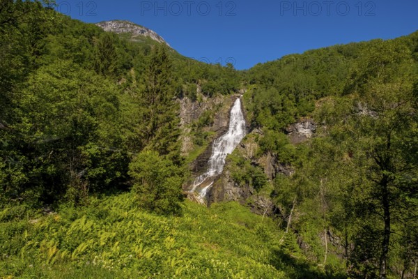 Waterfall near Stahlheim, mountains, baür sky, Skulestadmo, Hordaland, Norway, Scandinavia, Europe,
