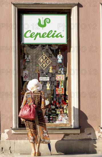 Langgasse, lady in front of shop window, GdaÅsk, Gdansk, Baltic Sea coast, Baltic Sea, pomorskie,