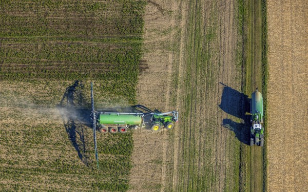 Aerial view, Tractor and agricultural spraying machine on a field, Paradiese, Soest, Soester Börde,
