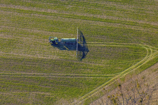 Aerial view, Tractor and agricultural spraying machine on a field, Paradiese, Soest, Soester Börde,