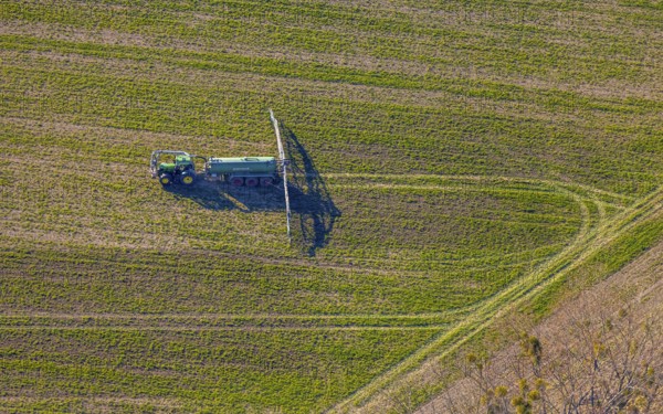 Aerial view, Tractor and agricultural spraying machine on a field, Paradiese, Soest, Soester Börde,