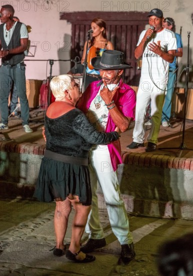 Old Cubans dance at the Salza market to the music of a live band, Trinidad, Cuba, Sancti Spíritus,
