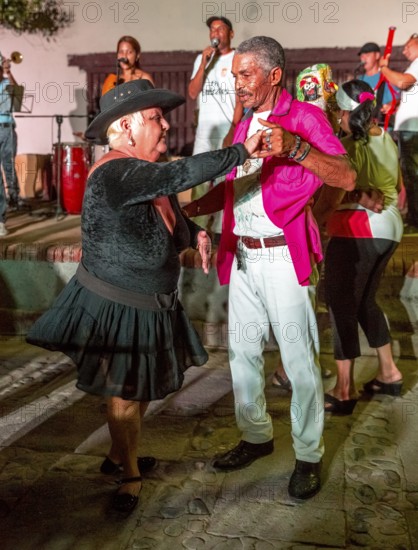 Old Cubans dance at the Salza market to the music of a live band, Trinidad, Cuba, Sancti Spíritus,