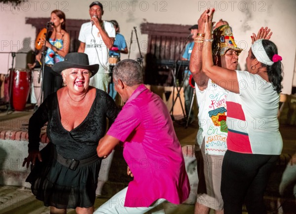 Old Cubans dance at the Salza market to the music of a live band, Trinidad, Cuba, Sancti Spíritus,