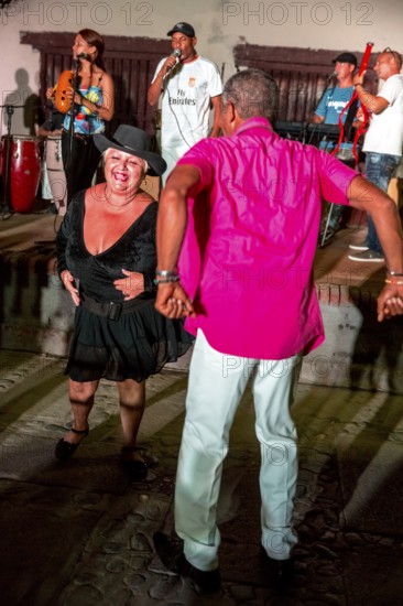 Old Cubans dance at the Salza market to the music of a live band, Trinidad, Cuba, Sancti Spíritus,