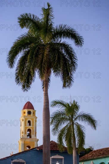 Church Convento de San Francisco de Asis of Trinidad with palm trees in the blue hour, Trinidad,