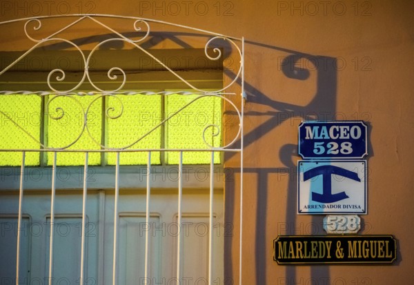 Street signs with the indication of a private accommodation for tourists of a Casa Paricular,