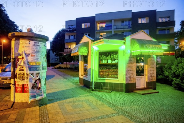 Green illuminated kiosk, blue hour, ÅšwinoujÅ'cie, Swinoujscie, Baltic Sea coast, Baltic Sea,