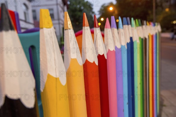 Large pencils as fence, kindergarten, ÅšwinoujÅ'cie, Swinoujscie, Baltic Sea coast, Baltic Sea,